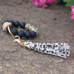 Women Silicone Bracelet Keychain Wristlet Beaded Key Ring Leopard Bangle Chains with Leather Tassel at Women’s Clothing store